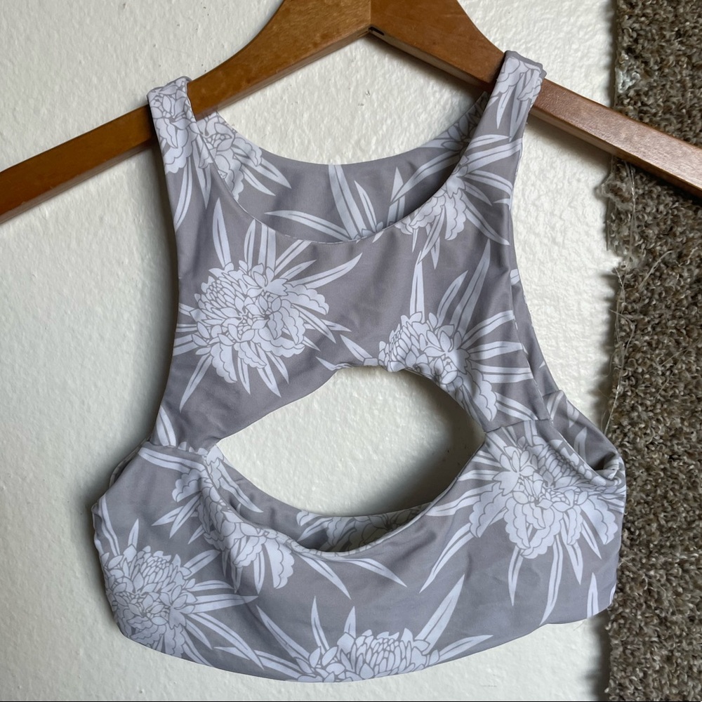 Mikoh Swim top with a cut out around the clavicles